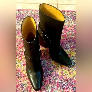 Black moto heeled boots with silver buckle